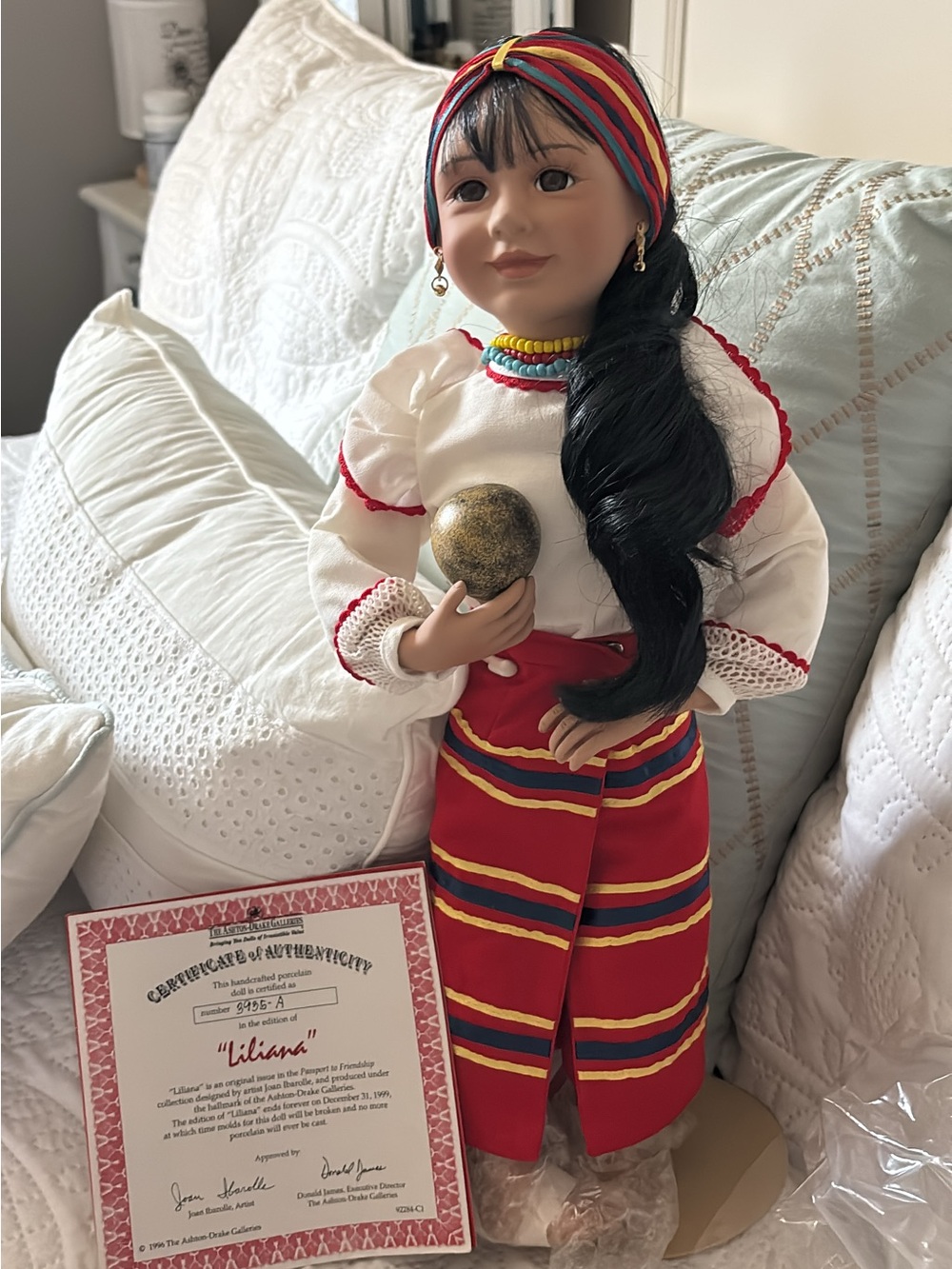 Liliana is a limited-edition bisque porcelain collector doll from The Ashton-Dra